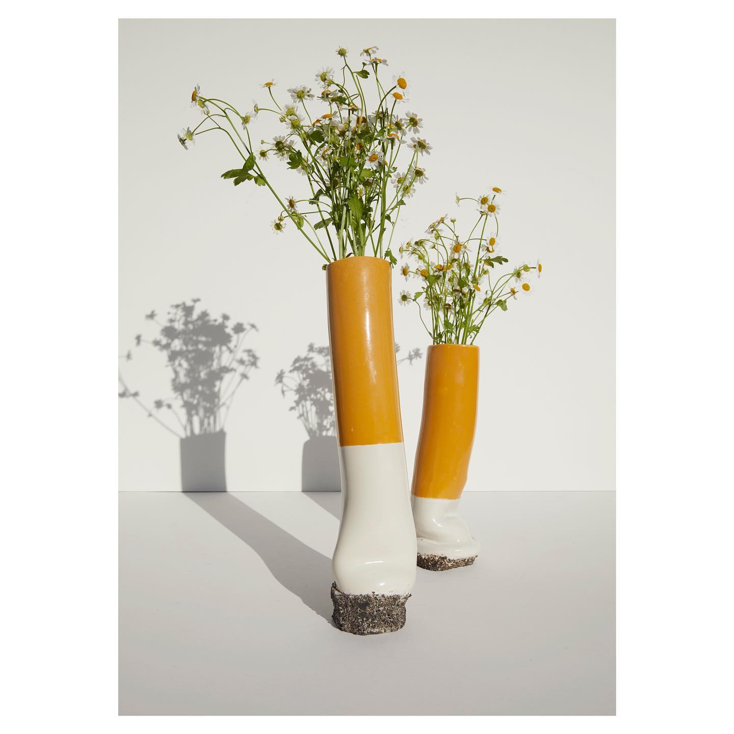 Cigarette vases with flowers